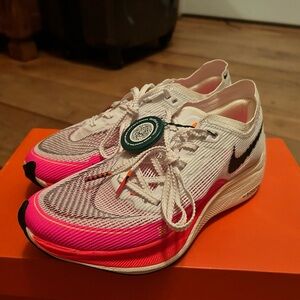 Nike ZoomX Vaporfly Next% 2 rawdacious pink and white.